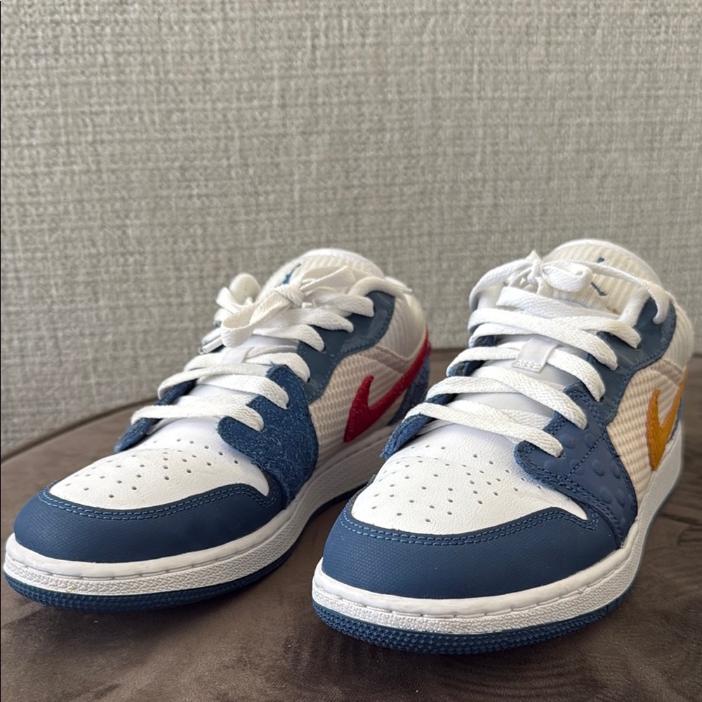 Low-Top Jordan Sneakers in White, Navy with Red & Yellow Swoosh